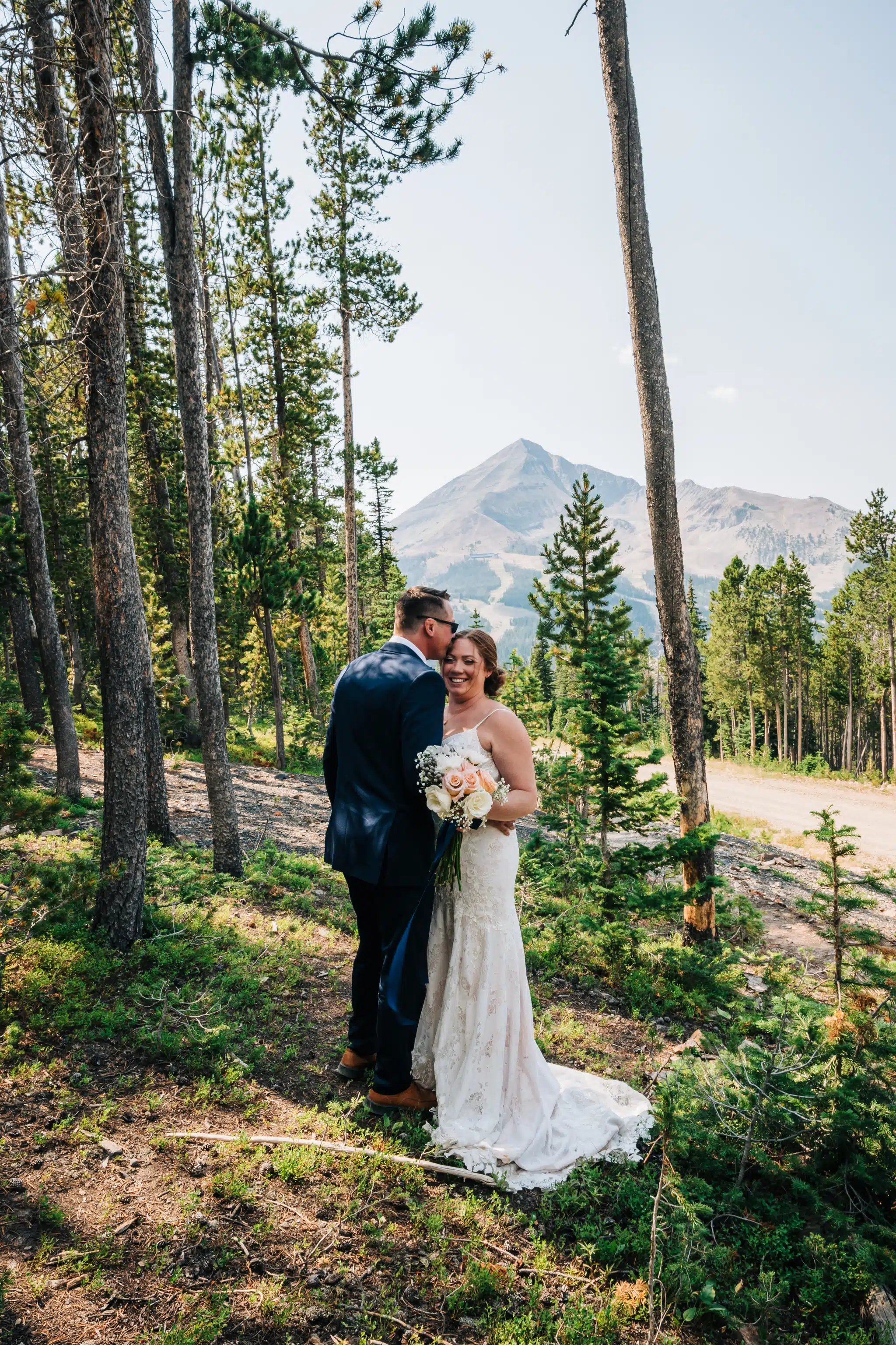 Couple Infront Of Lone Peak Big Sky Resort Wedding Venue In Montana