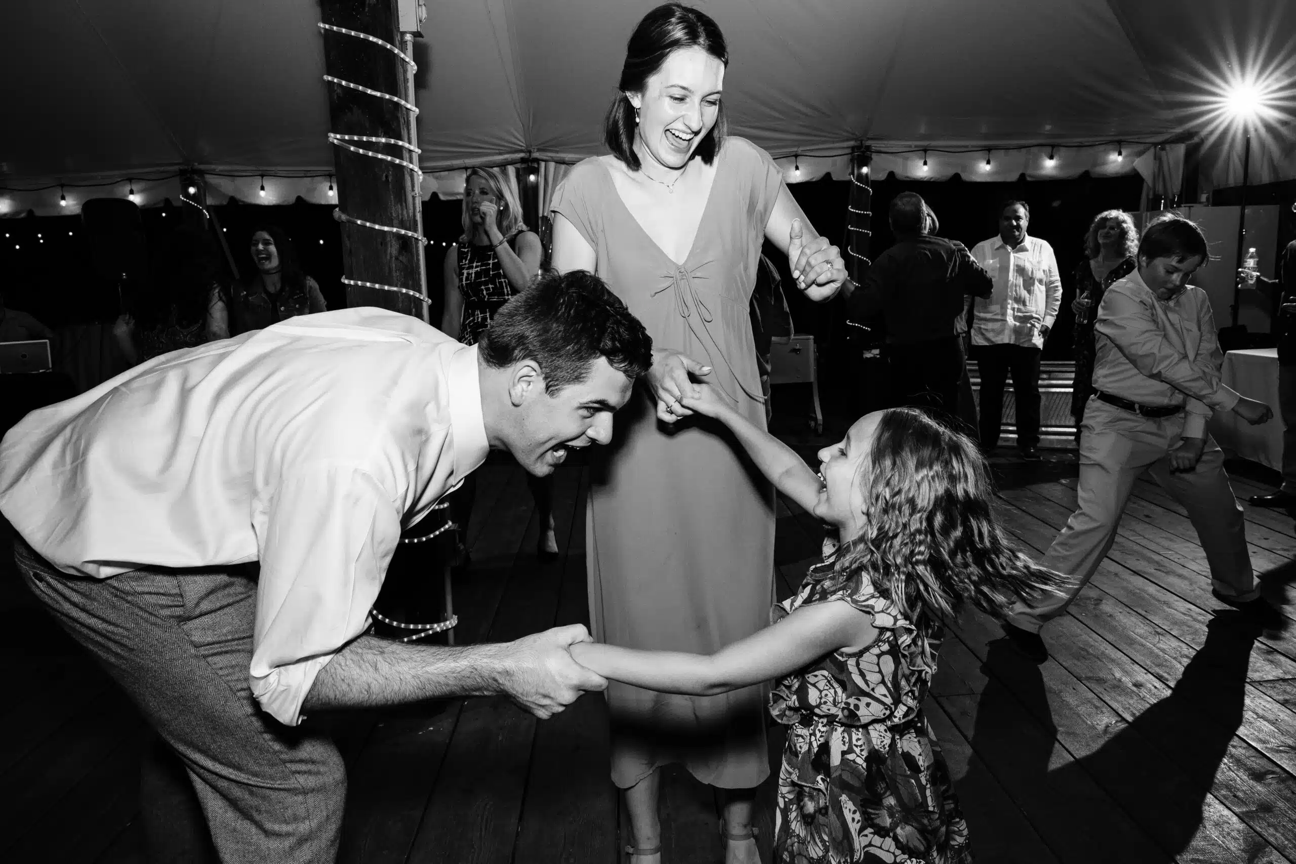 Hours Of Wedding Photography // Reception Photo Of Couple Dancing With Young Girl