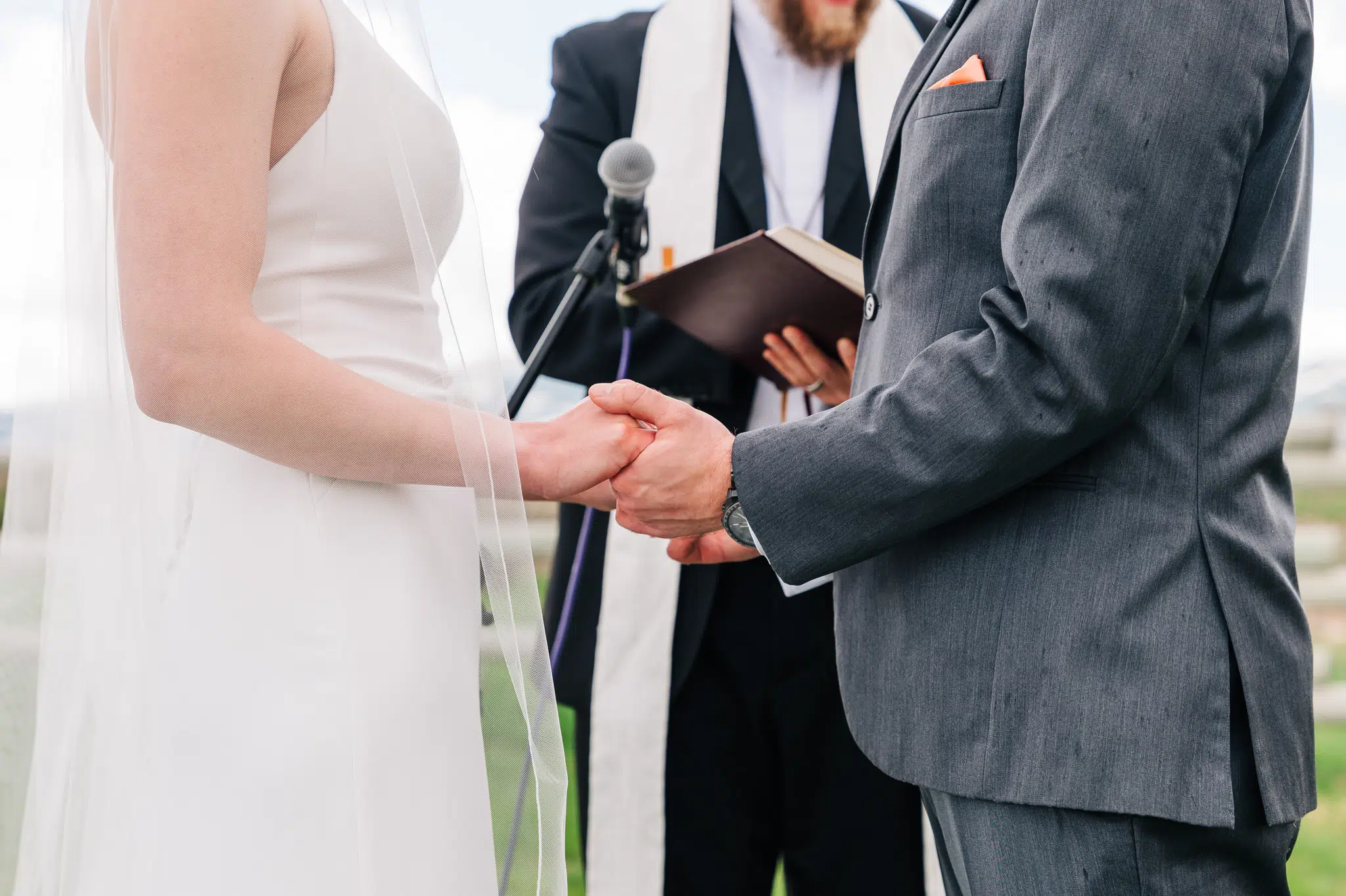 Unplugged Wedding Ceremony. Couple Holding Hands