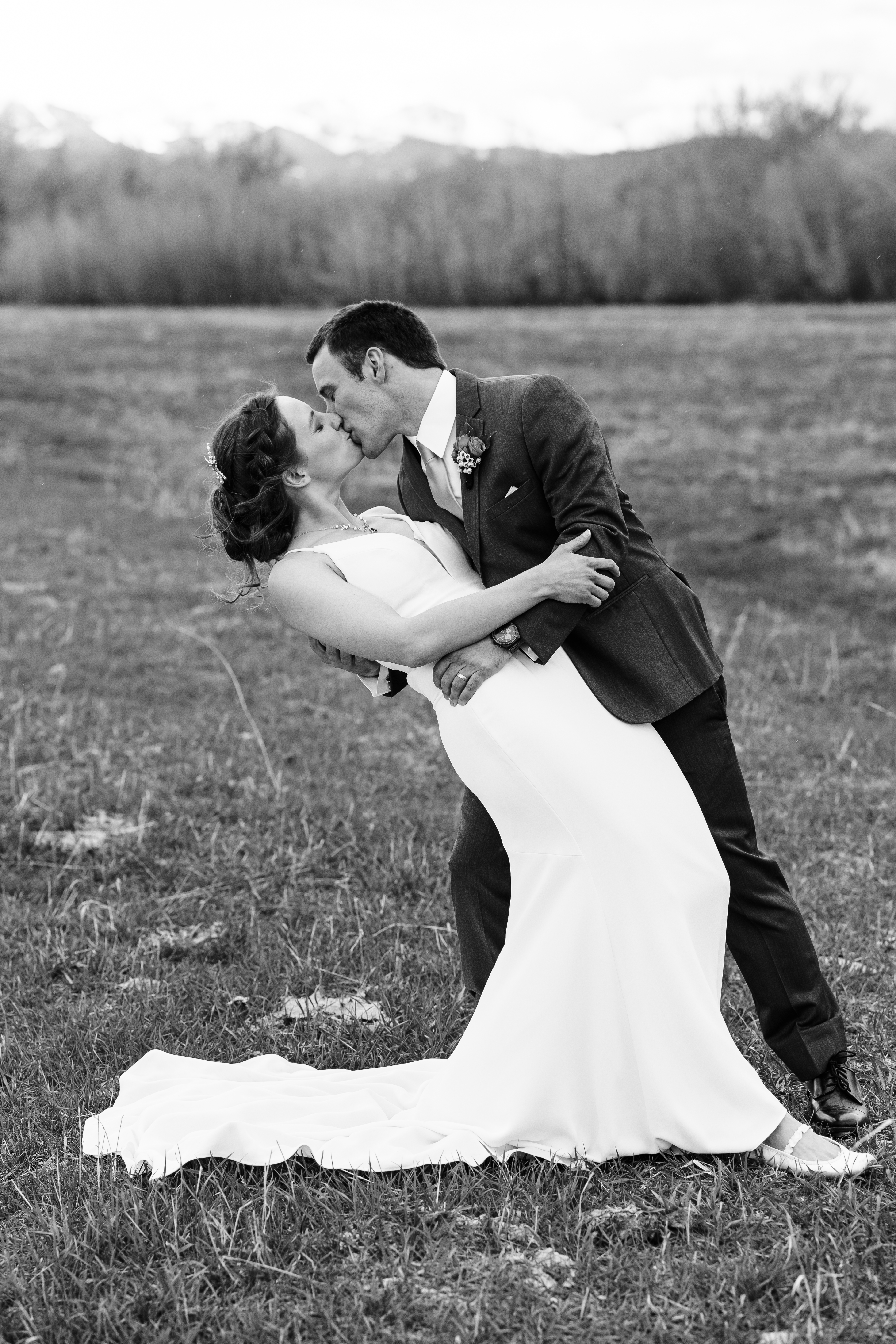 Should You Tip Your Wedding Photographer - Bride And Groom Kissing - Photo By Charles Moll Photography