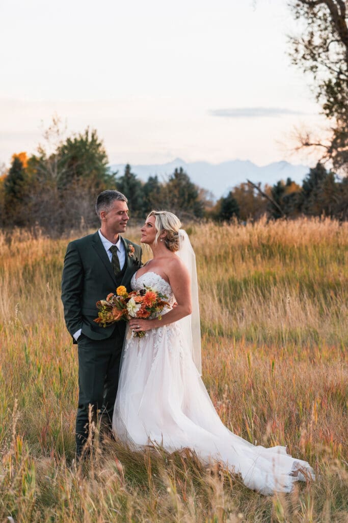 Couple With Mountains In The Background | Plan A Wedding In Montana